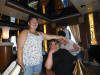 I use my head to hold up Hailey's arm