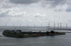 Wind turbines and island just outside of port