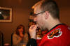Michael stuffs his face for Nancy's amusement
