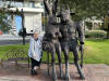 Chris poses with some funky characters in Canary Wharf