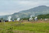 Volcanic steam rising from ground