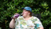 Kim pounds back the wine