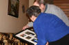 Mom and Dad check out their gift